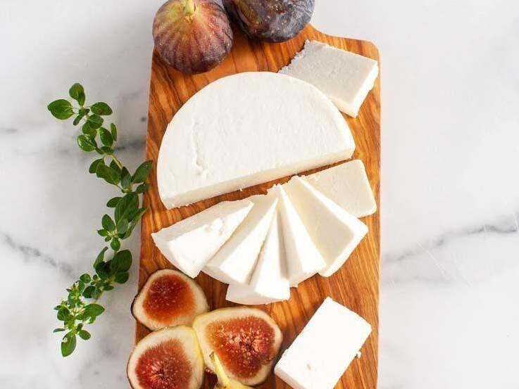 Greek Cheese Guide: 12 Traditional Varieties 7 Creamy Greek manouri cheese served with honey and fresh figs